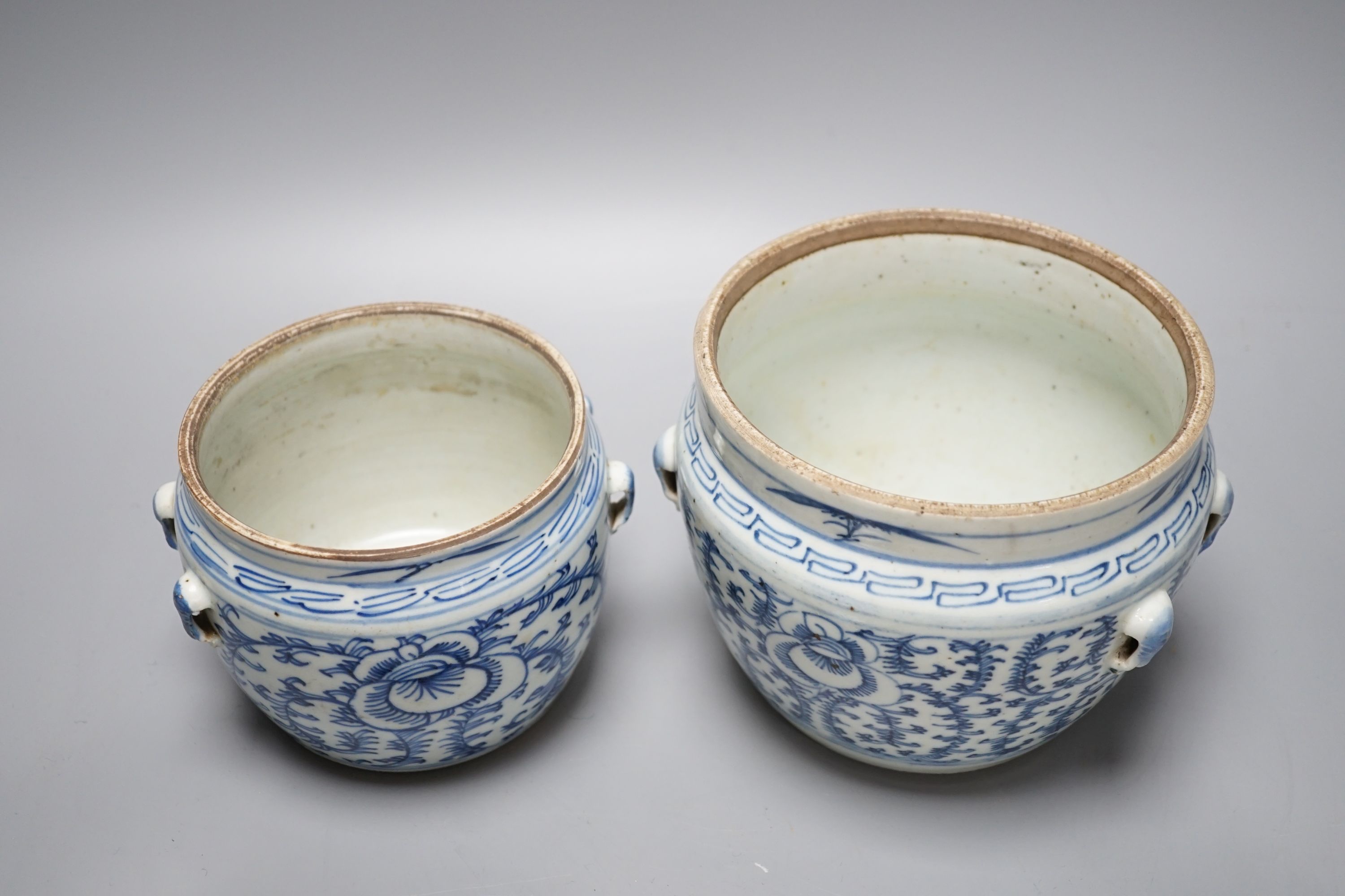 Two Chinese blue and white jars and covers - tallest 20cm high